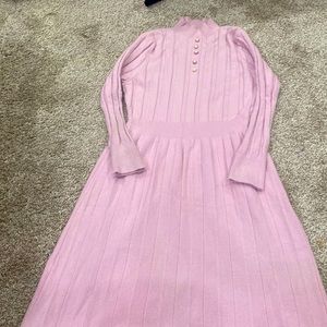 A pink woollen dress